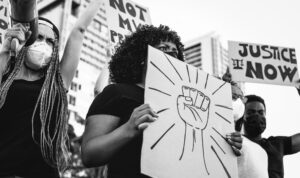 Demonstrators from different cultures and race protest on street for equal rights