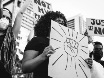 Demonstrators from different cultures and race protest on street for equal rights