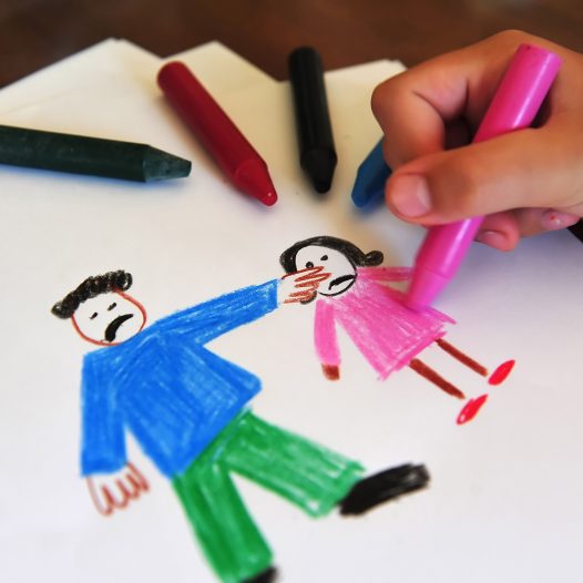 Crayon drawing of child and adult with the adult pointing angrily at the child.