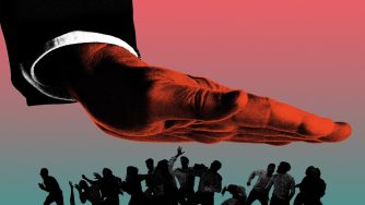 Large hand pushing down and oppressing a group of people.